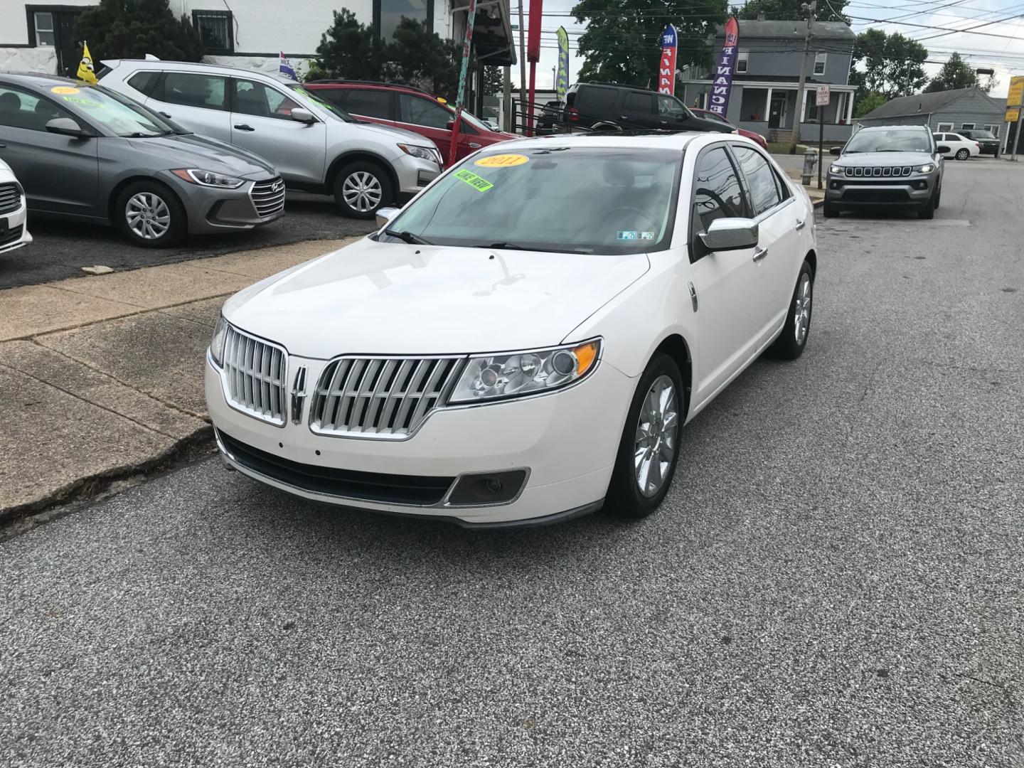 2011 White /Cream Lincoln MKZ (3LNHL2JC4BR) with an 3.5 V6 engine, Automatic transmission, located at 577 Chester Pike, Prospect Park, PA, 19076, (610) 237-1015, 39.886154, -75.302338 - 2011 Lincoln MKZ: Only 108k miles, navigation system, AWD, backup camera, sunroof, new PA inspection, runs LIKE NEW! This vehicle comes inspected and has been given a bumper to bumper safety check. It is very clean, reliable, and well maintained. We offer a unique pay plan that is known for being - Photo#2